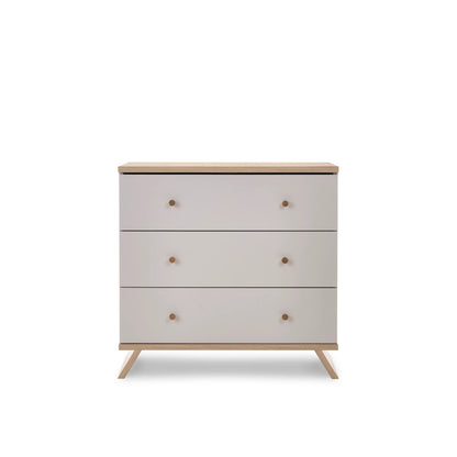 Obaby Thea changing unit chest changer in light wood and white with three drawers and angled legs